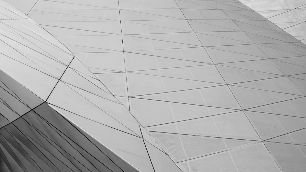 Grayscale geometric panels of an architectural facade